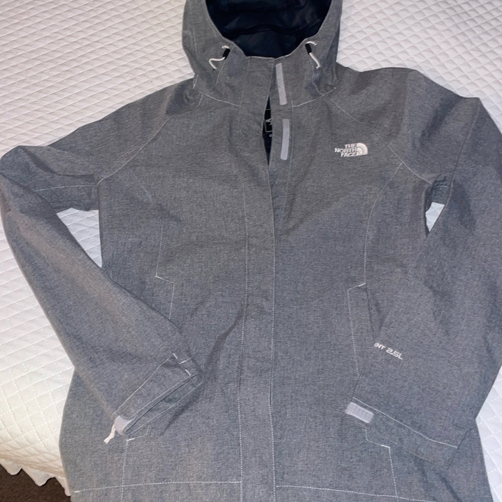 Grey The North Face rain jacket.